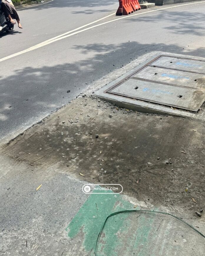 bekas galian kabel, jalan bandung jadi berlubang